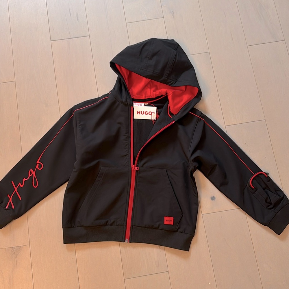 New with tags. Hugo kids black size 8 water tech black zipper jacket